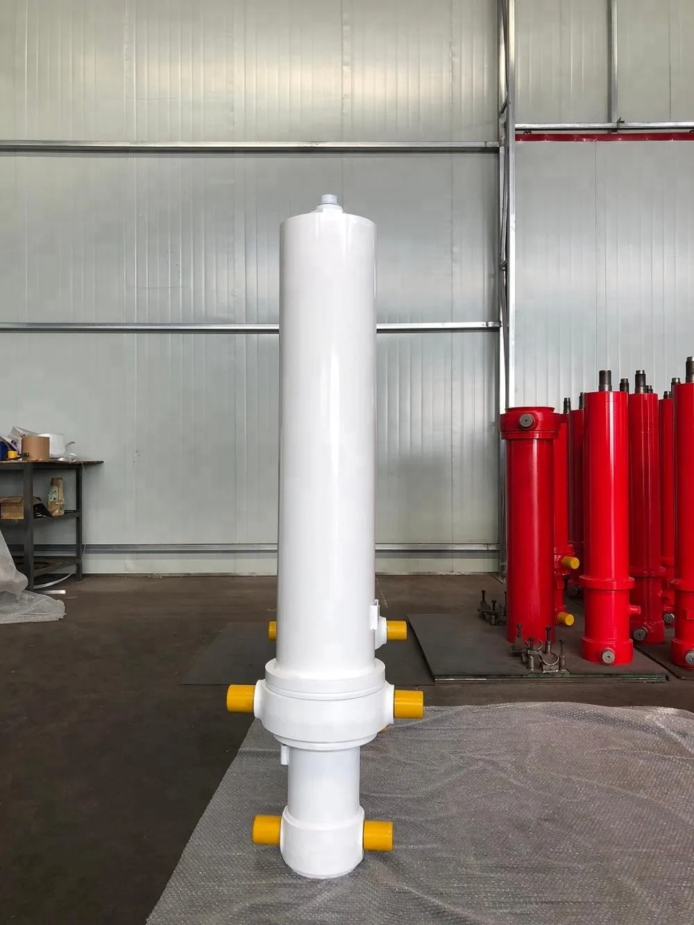 front mounted multi-stage cylinder